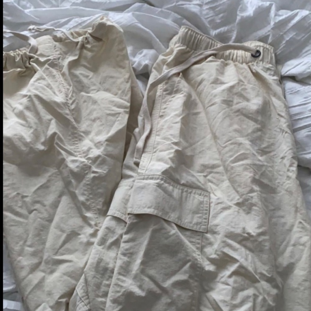Cream colored parachute pants